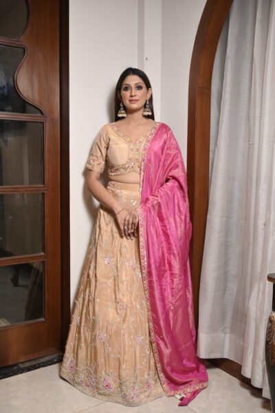 Elegant Peach Embroidered Lehenga Set with Vibrant Pink Dupatta